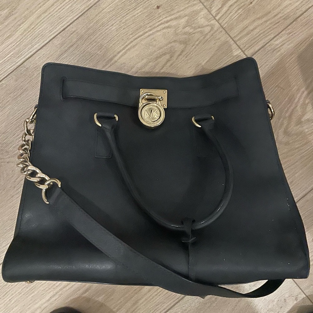 Michael Korrs Black Leather Tote Bag with Gold Accents